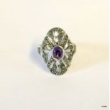 A silver and amethyst art deco style ring