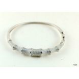 A silver and Cz bamboo style bangle