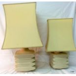 A pair of matched table lamps largest 65cm