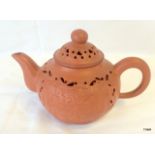 Chinese terracotta teapot with marks to the base