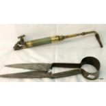 A brass blow lamp torch head and pair of sheep shearing scissors