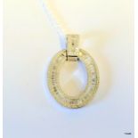 A silver and large chanel set Cz ""donought"" pendant necklace