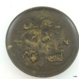 Japanese bronze plate with bird and floral decoration. 15cm diameter