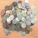 A large collection of coinage to include silver Victorian pennies, groats etc