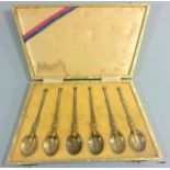 A silver gilt set of hallmarked tea spoons