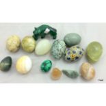A collection of hardstone eggs and figures to include alabaster