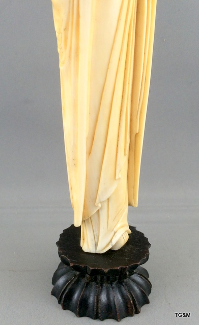 A carved ivory figure of a sage on a wooden stand 20cm high. - Image 3 of 10