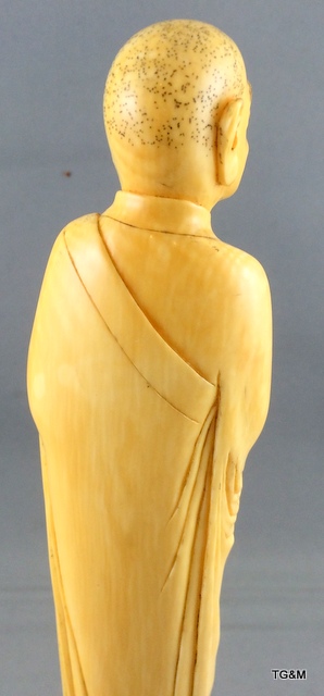 A carved ivory figure of a sage on a wooden stand 20cm high. - Image 6 of 10