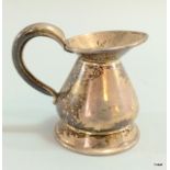 A silver hallmarked quarter gill measure jug