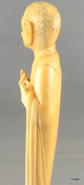 A carved ivory figure of a sage on a wooden stand 20cm high. - Image 8 of 10