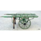 An antique hand cart / stretcher used as a Porters gurney/undertakers cart with metal rings 80 x