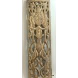 An ornate wood carving 100 x 30cm