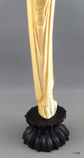 A carved ivory figure of a sage on a wooden stand 20cm high. - Image 5 of 10