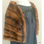 A brown mink silk lined shawl / shrug