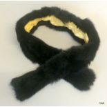 A Black Coney silk lined pull through scarf