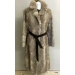 A full length grey Coney rabbit fur coat.