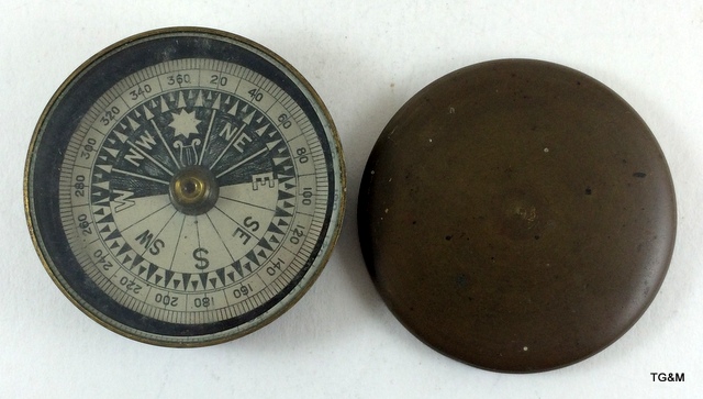 A brass compass, possibly Edwardian