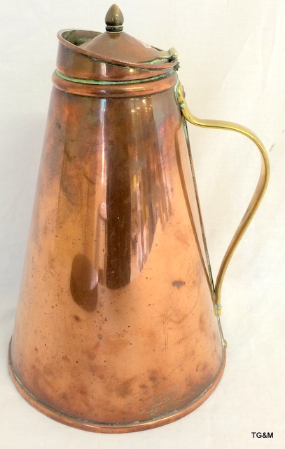 A copper lidded water jug with ceramic liner marked W.A.S Benson 25cm high