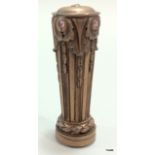 A brass seal in the form of a column inset with semi precious stones