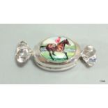 An unusual silver ring box in the form of a sweet with enamel set to the lid