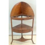 A mahogany corner wash stand with single drawer and stretcher with splayed feet