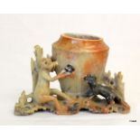 A Soap Stone monkey and dog figural pot