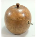 A fruitwood orange shaped tea caddy