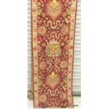 An Axminster Hall Carpet Red/Cream 650 x 70 cm