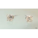 A good pair of 14ct white gold diamond stud earrings of 1.8ct's