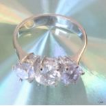 An 18ct white gold three stone diamond ring of 2.25 ct's