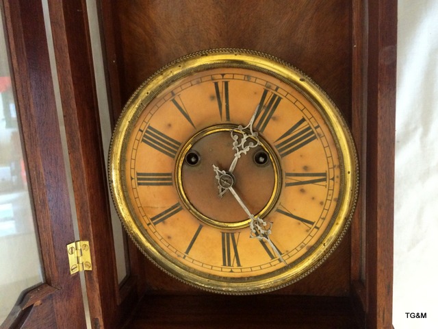 A mahogany pendulum clock with key - Image 4 of 6