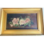 An oil on canvas still life of roses signed H W 1910