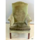 A Parker knoll high backed armchair needs recovering