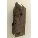 A 3/4 length genuine vintage mink coat.