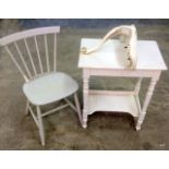 A white painted spindle back chair, dressing table and a white painted and gilt shelf