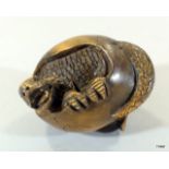 Well carved Japanese netsuke in the for of a salamander