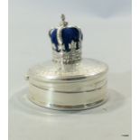 A silver pin cushion in the form of a crown with ring box to the base