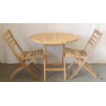 Round garden table with two chairs