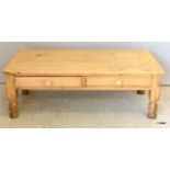 A small pine coffee table with two drawers. 36 x 102 x 49cm