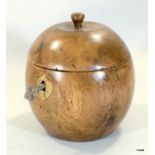 A novelty wooden tea caddy in the form of an apple