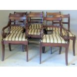 A set of 8 mahogany dining chairs to include carvers