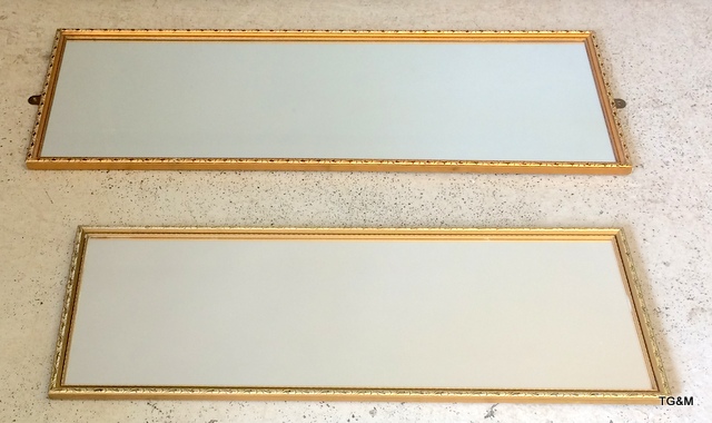 A pair of gilt wall mirrors