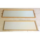 A pair of gilt wall mirrors