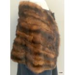 A brown mink silk lined shawl / shrug