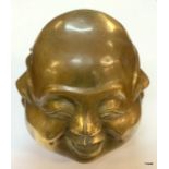 Four faced Buddha head