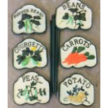 6 x cast iron vegetable signs