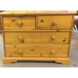 A pine 2/3 chest of drawers