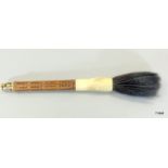 Chinese Calligraphy brush with bamboo handle bearing marks and cloisonne finial