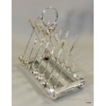 Silver plated toast rack in the form of golf clubs