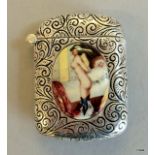 A silver plated vesta case with nude images